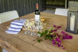 Flowers, glasses and french wine