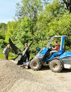 Using a digger to prepare petanque court