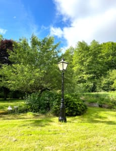 Restored Narnia lamppost in the gite garden
