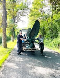 Moving the statue along the main road