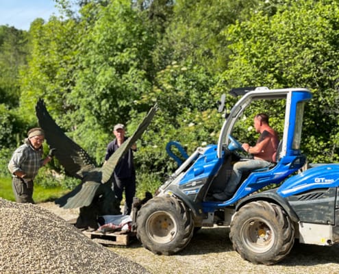 Using the digger A digger is used to help move the statue