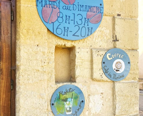 Cafe sign in Cadouin Cafe sign in Cadouin