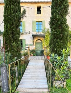Shop front in Cadouin Ornate entrance to a shop in Cadouin, Perigord