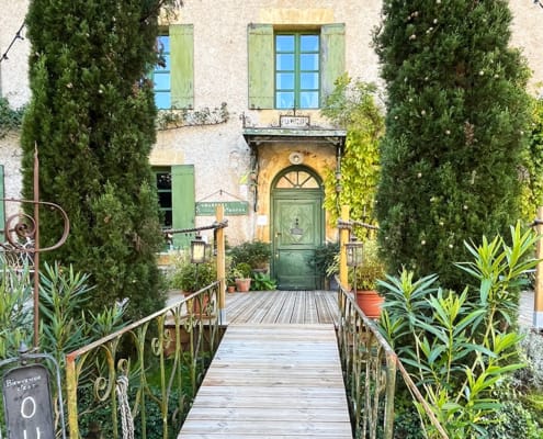 Shop front in Cadouin Ornate entrance to a shop in Cadouin, Perigord