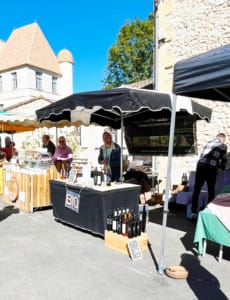 Wine stall at Issigeac market in the Dordogne