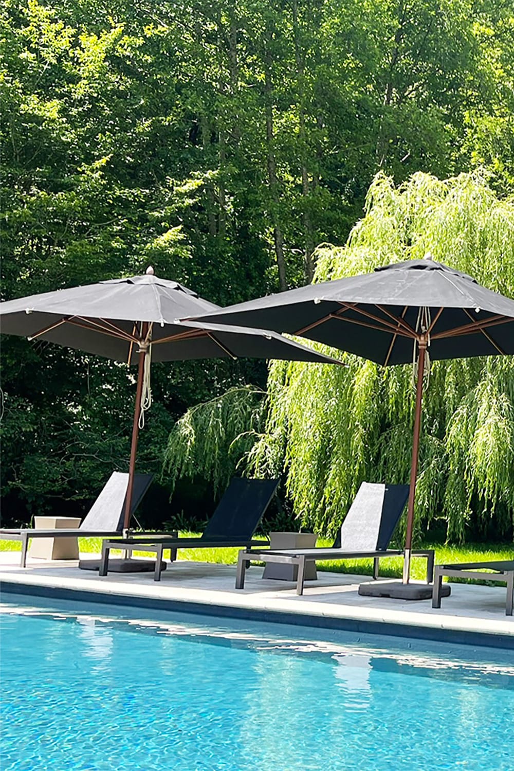 Relaxing by Gite pool Sunbeds by the gite pool in the Dordogne